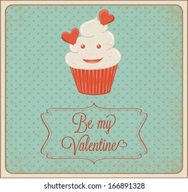 Valentine's day card with cupcake and "Be my Valentine" sign.