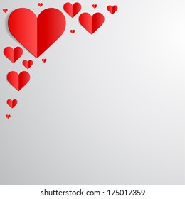 Valentines Day card with cut paper hearts in the corner