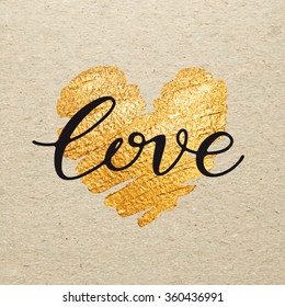 Valentines day card. Love calligraphy lettering with gold paint heart on craft background. Hand drawn letters.