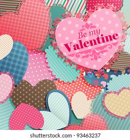 Valentine`s Day card with pile of paper hearts and place for text.