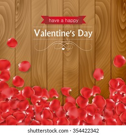 Valentines day card with rose paddles on a wooden background.