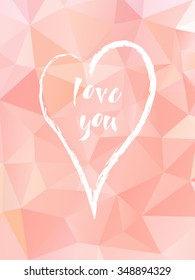 Valentine's day card with writing "love you" inside the heart