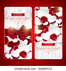 Valentines day cards with bow, paper hearts and rose petals on a white wooden background, set of two.