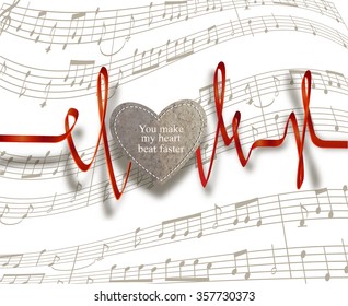 Valentine's Day composition with notes, ribbon and carton heart