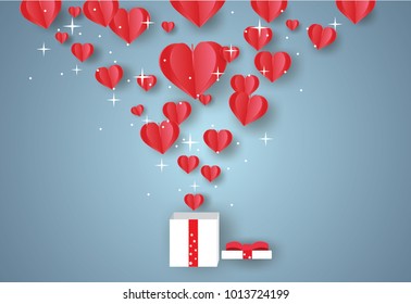 Valentine's day concept.Red balloons in heart shape are floating out of a white gift box.Vector illustration.Paper and craft art