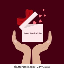 Valentine's Day concept. Hands hold gift box with heart and  ribbon baw. Vector flat icon. Happy Valentine's Day.