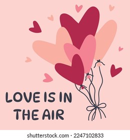 Valentines day concept with heart shaped balloons and love is in the air text. FEstive card,print,poster etc