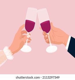 Valentine's day concept. A man and a woman celebrate February 14 and clink glasses with red wine. Pink background.