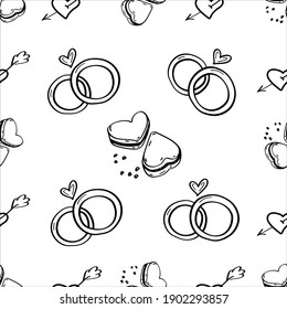 Valentine's Day doodle seamless pattern. Romantic hand-drawn background with wedding rings and heart-shaped cookies. Black outline. Ideal for wrapping paper, textiles, wedding design. Vector.