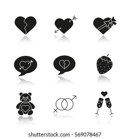 Valentine's Day drop shadow black icons set. Heartbreak, love messages, sex and erotic symbols, champagne, teddy bear, arrow piercing heart, candy box. Isolated vector illustrations