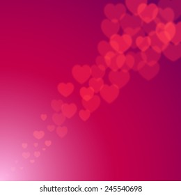 Valentines Day explosion of scattered bokeh hearts