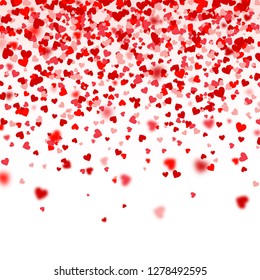Valentines Day Falling Red Blurred Hearts On White Background. Heart Shaped Paper Confetti. February 14 Greeting Card.