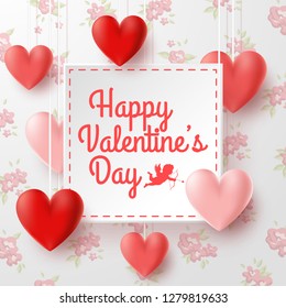 Valentines day greeting card with cupid on flowers background