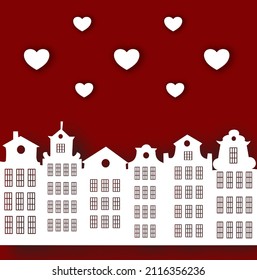 Valentine's Day greeting card, cut out of paper.Old houses sights of Europe. Cardboard city. The applique is made of white and red.The old street of Holland, the silhouette of houses made of cardboard