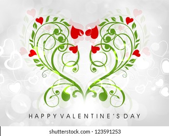 Valentine's Day greeting card or gift card with floral decorative heart on grey background. EPS 10.