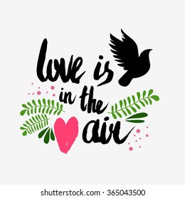 Valentines day greeting card. Love is in the air. Lettering, calligraphy and typography. Made with ink and brush. Print on t-shirts and bags, Valentine's day or Save the date card.