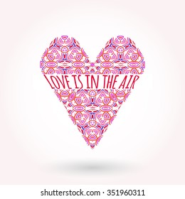 Valentine's Day greeting card. Modern ornamented flat styled heart with saying "Love is in the air"