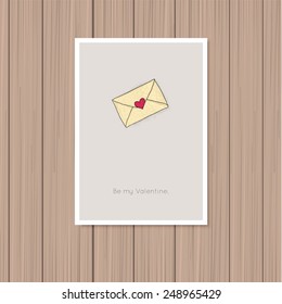 Valentine's day greeting card on a wooden background