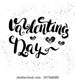 Valentine's Day- hand painted ink brush pen calligraphy. Isolated on an ink texture backdrop.