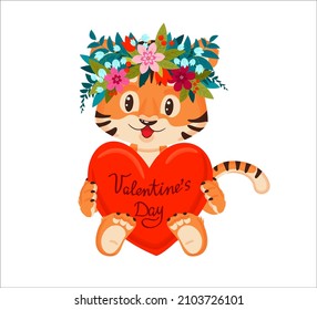 Valentine's Day, a little tiger in a flower wreath on his head, holds a large heart in its paws with the inscription. Vector illustration in cartoon style, for postcards, books, print