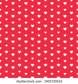 Valentine`s day minimalist seamless pattern. Small tiny white hearts on red background. Perfect for fabrics, textile design, wrapping paper, postcards