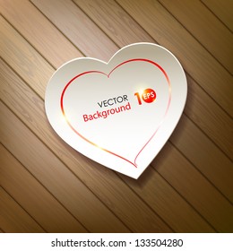 Valentine's Day. Paper heart on a background of wood. Vector eps 10.