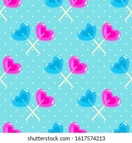Valentines day pattern with heart shape sweet lollipop sticks on blue polka dot background