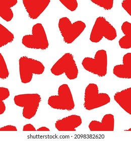 Valentine's Day. Red heart seamless pattern. Romantic decorative background for Valentine's Day gift paper. Repeated hand-drawn hearts. Simple vector heart.