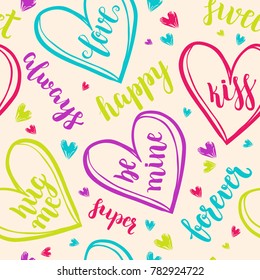 Valentine's Day Romantic seamless pattern with brush calligraphy style lettering and hearts.