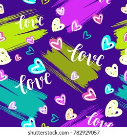 Valentine's Day Romantic seamless pattern with brush calligraphy style lettering and hearts.
