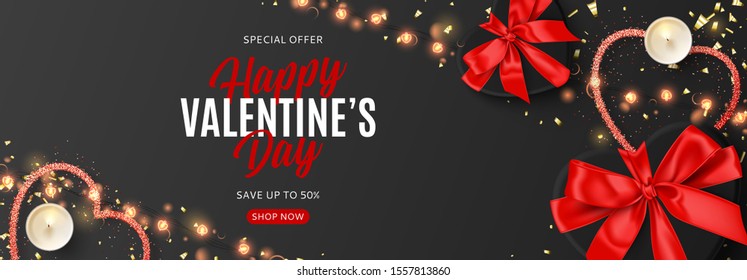 Valentine's Day sale background. Vector illustration with realistic black gift boxes, sparkling light garland, candles and confetti on black background. Promo discount banner.