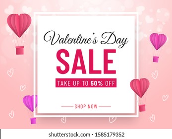 Valentine's Day Sale Banner Design with 50% Discount Offer, Paper Cut Hot Air Balloons and Hearts Decorated on Pink Background.