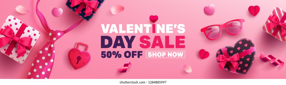 Valentine's Day Sale Poster or banner with gift box and sweet heart on pink background.Promotion and shopping template for Love and Valentine's day concept.Vector EPS10