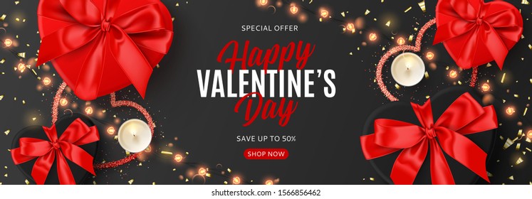 Valentine's Day sale promo banner. Vector illustration with realistic red and black gift boxes, sparkling light garland, candles and confetti on black background. Promo discount banner.