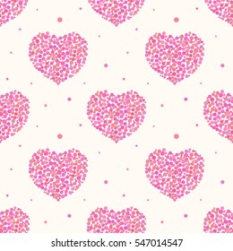 Valentine's Day seamless pattern background with pink dotted hearts.
