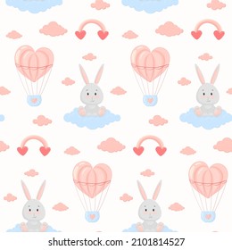 Valentine's day seamless pattern with bunny on a cloud and flying ball. Delicate pattern for the design of nursery, gift paper or cards. Pink and blue pattern with bunny, pink clouds and rainbow.