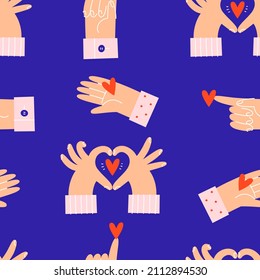 Valentine's day seamless pattern with hearts in hands.