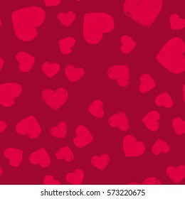 Valentines Day seamless pattern with red hearts sprayed for background, card or wrapping paper.