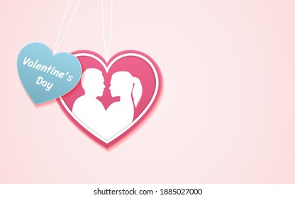 Valentine's day and silhouette kissing couple in heart shape paper cut on pink color background