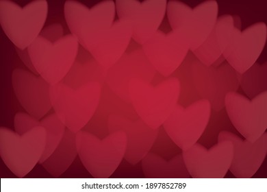 Valentines day wallpaper. red hearts on red background. blurred light effect 