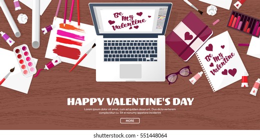 Valentines Day. Workplace with table. Design Equipment. Drawing on paper. Handmade love card. Typewriting. Greeting. February 14.Wood.
