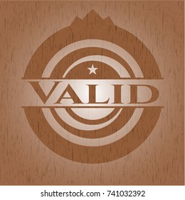 Valid badge with wood background