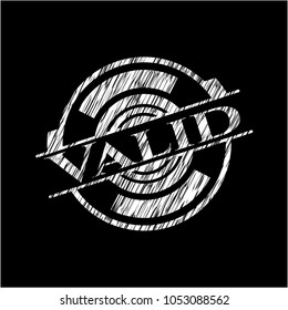 Valid chalk emblem written on a blackboard