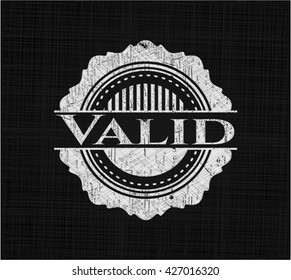 Valid chalkboard emblem on black board