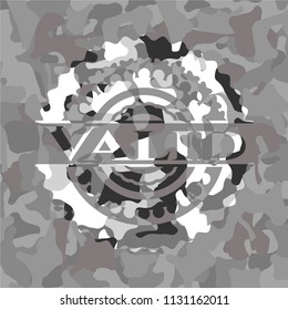 Valid on grey camouflage texture