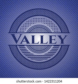 Valley emblem with jean background. Vector Illustration. Detailed.