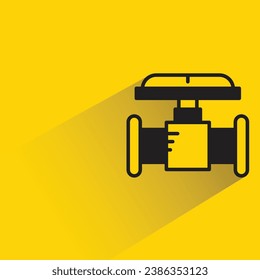valve and pipe with shadow on yellow background