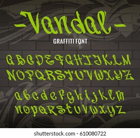 Vandal Graffiti Font. Set of graffiti style letters on brick wall background with abstract graffiti arrows. Vector alphabet. Old school graffiti glyphs.