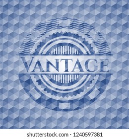 Vantage blue badge with geometric pattern.