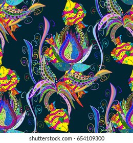 Varicolored vector seamless illustration. Tropical seamless pattern with many abstract flowers.
